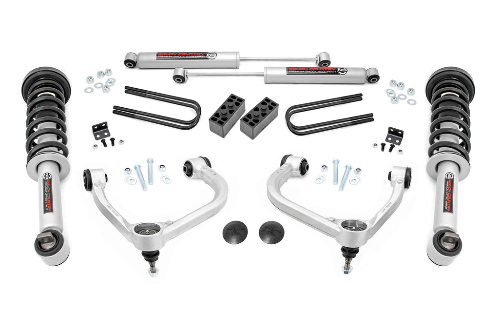 Components of the Rough Country 3-inch lift kit for Ford F-150 4WD, including N3 struts and suspension parts