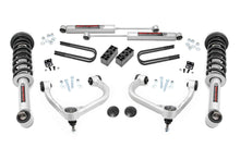 Load image into Gallery viewer, Components of the Rough Country 3-inch lift kit for Ford F-150 4WD, including N3 struts and suspension parts