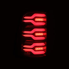 Load image into Gallery viewer, AlphaRex 19+ Dodge Ram 1500 Luxx-Series LED Tail Lights Black/Red w/Activ Light/Seq Signal