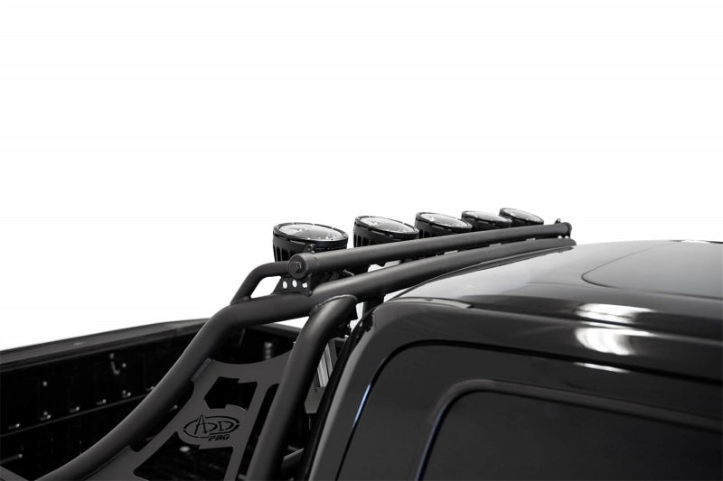 Ford F-150 with Addictive Desert Designs Pro Chase Rack and light actuator kit, no lights included