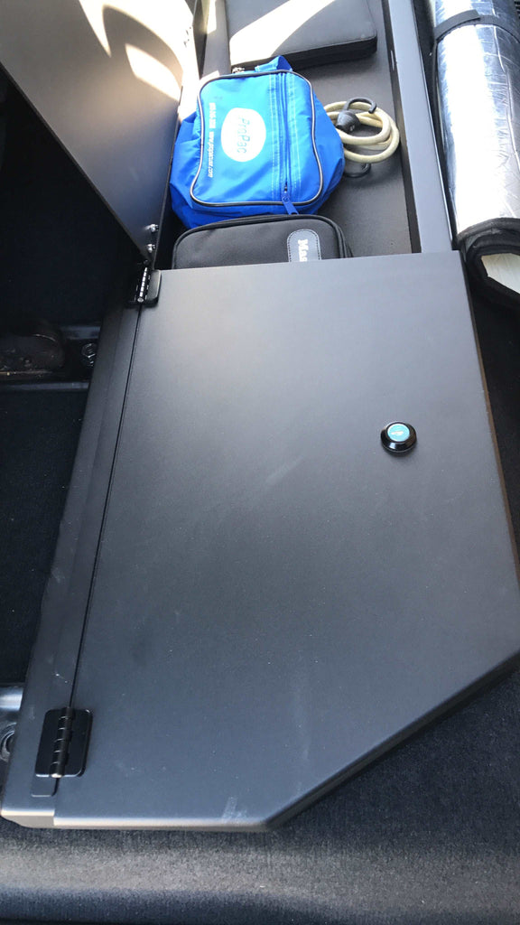 Under seat long box storage in Toyota Tundra CrewMax with laptop and accessories stored inside