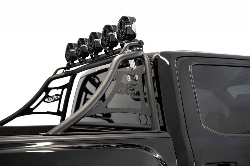 Side view of Ford F-150 equipped with Addictive Desert Designs Pro Chase Rack