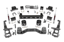 Load image into Gallery viewer, Components of a 6-inch lift kit for Ford F-150 2WD, including sway bars and suspension parts