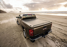 Load image into Gallery viewer, Roll-N-Lock 2024+ Toyota Tacoma 5ft A-Series Retractable Tonneau Cover