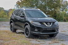 Load image into Gallery viewer, Close-up view of the 1.5 Inch Lift Kit installed on a Nissan Rogue 4WD (2014+)