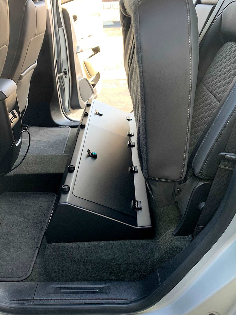 custom designed storage compartment under the back seat of a Chevrolet Colorado