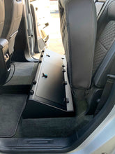 Load image into Gallery viewer, custom designed storage compartment under the back seat of a Chevrolet Colorado