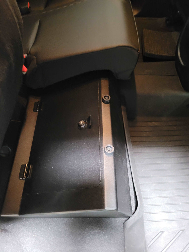 Interior view of a Chevrolet Colorado with a under-seat lockable storage box