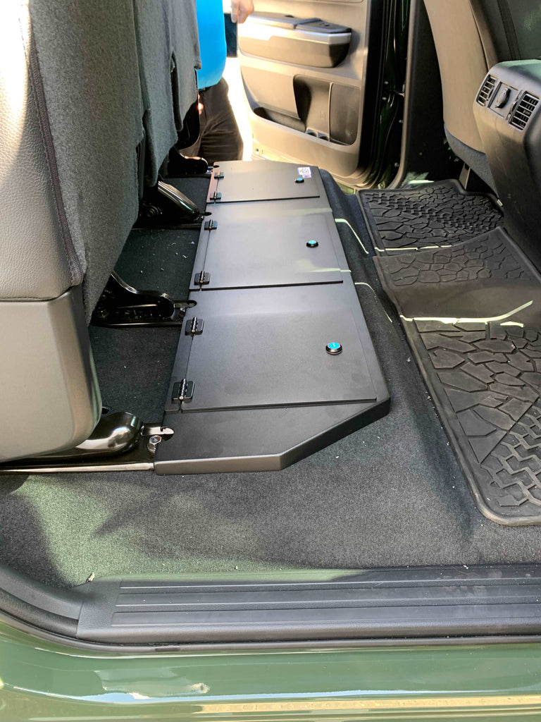 Open view of the Toyota Tundra CrewMax under-seat lockable storage with large compartment