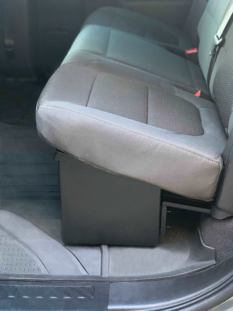 Chevrolet Silverado's under-seat area equipped with a custom-fit lockable storage unit