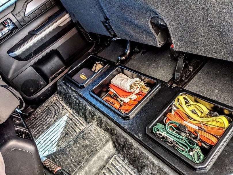 Under-seat storage system for 2014-2021 Tundra models with tools organized inside