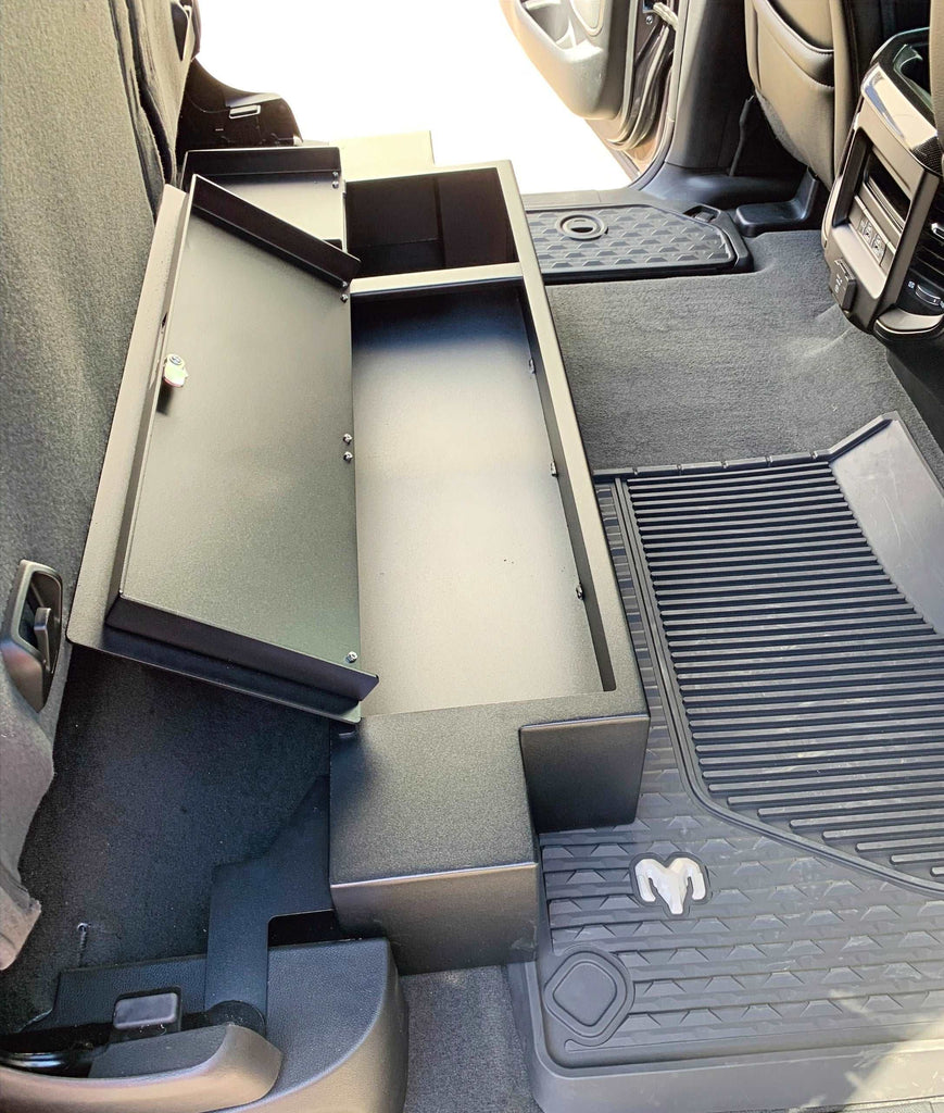 Lockable storage compartment under the rear seat of a 2019-2024 RAM 1500 Crew Cab