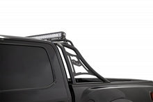 Load image into Gallery viewer, Close-up of the Pro Chase Rack with light bar mount on Ford F-150