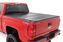 Load image into Gallery viewer, Hard Tri-Fold Flip Up Bed Cover - 5'9 In. Bed - Chevy GMC 1500 (14-18)