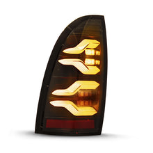 Load image into Gallery viewer, AlphaRex 2005-2015 Toyota Tacoma LUXX LED Taillights Blk w/Active Light/Seq Signal