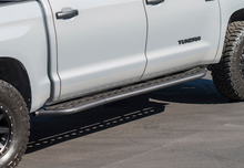 Load image into Gallery viewer, Cali Raised 14-21 Toyota Tundra Step Ed Rock Sliders - Kick Out BedLiner Filler Plate/Raw Steel