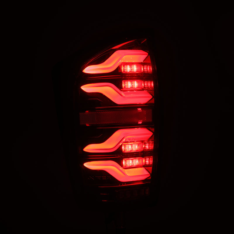 AlphaRex 16+ Toyota Tacoma LUXX LED Taillights Alpha Blk w/Activ Light/Seq Signal
