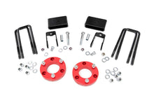 Load image into Gallery viewer, Rough Country 2 Inch Lift Kit - Red Spacers - Nissan Titan XD 2WD 4WD (2016-2023)