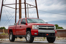 Load image into Gallery viewer, Chevy Silverado equipped with the 5-inch Rough Country lift kit, displayed outdoors