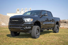 Load image into Gallery viewer, Ram 1500 equipped with a 6-inch Rough Country lift kit, showcased in an outdoor setting