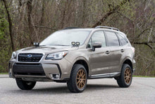 Load image into Gallery viewer, Subaru Forester equipped with a 2-inch Rough Country lift kit parked outdoors