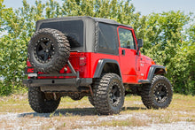 Load image into Gallery viewer, tj-rear-bumper-tire-carrier-install2.jpg