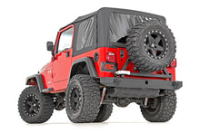 Load image into Gallery viewer, tj-rear-bumper-tire-carrier-install.jpg
