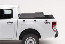 Load image into Gallery viewer, Extang Nissan Frontier(5ft Bed) (w/ or w/o Track Sys) (5ft) Solid Fold 2.0