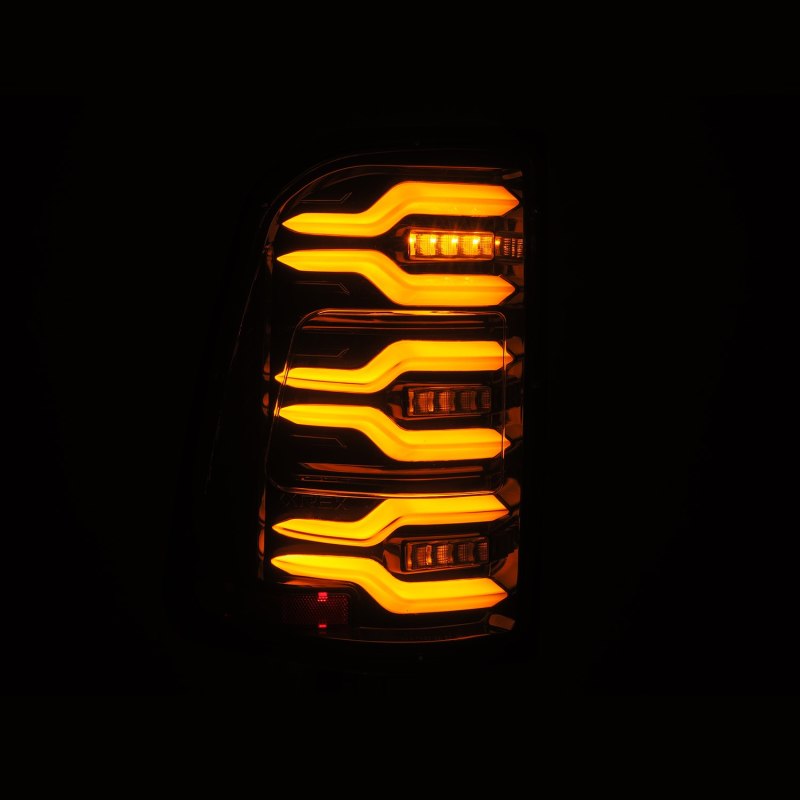 AlphaRex 2019+ Dodge Ram 1500 Luxx-Series LED Tail Lights Alpha-Black w/Active Light/Seq Signal