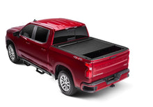 Load image into Gallery viewer, Roll-N-Lock Chevy Silverado/Sierra 2500/3500 SB 77-3/8in M-Series Retractable Tonneau Cover