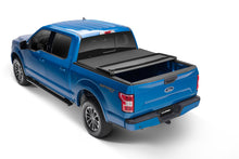 Load image into Gallery viewer, Lund Nissan Titan (5.5ft. Bed w/o Titan Box) Genesis Elite Tri-Fold Tonneau Cover - Black