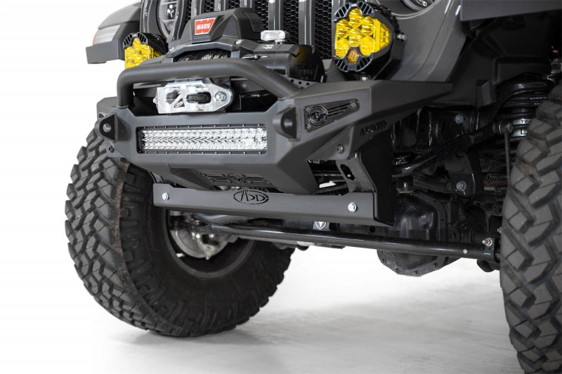 Jeep JL/JT sway bar skid plate with integrated yellow fog lights by Addictive Desert Designs