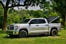Load image into Gallery viewer, UnderCover Toyota Tundra 5.5ft SE Bed Cover - Black Textured