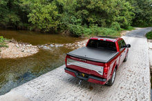 Load image into Gallery viewer, UnderCover Ford F-150 5.5ft SE Bed Cover - Black Textured