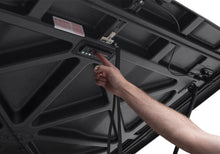 Load image into Gallery viewer, UnderCover Nissan Frontier 5ft Elite Bed Cover - Black Textured
