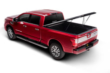 Load image into Gallery viewer, UnderCover Nissan Titan 6.5ft SE Bed Cover - Black Textured