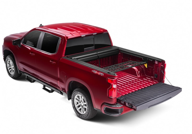 Roll-N-Lock 07-14 Chevy Silverado/Sierra w/ OE Rail Caps LB 96-1/4in Cargo Manager