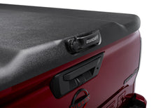 Load image into Gallery viewer, UnderCover Nissan Frontier 5ft Elite Bed Cover - Black Textured