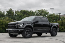 Load image into Gallery viewer, The black Road Armor 17-20 Ford Raptor Stealth Front Non-Winch Bumper - Tex Blk is parked in a parking lot.
