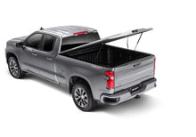 Load image into Gallery viewer, UnderCover Chevy 2500/3500 HD 6.9ft Elite LX Bed Cover - Gasoline