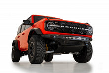 Load image into Gallery viewer, Front view of the Addictive Desert Designs Stealth Fighter Front Bumper on a 2021 Ford Bronco