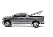 Load image into Gallery viewer, UnderCover Chevy 2500/3500 HD 6.9ft Elite LX Bed Cover - Pacific Blue Metallic
