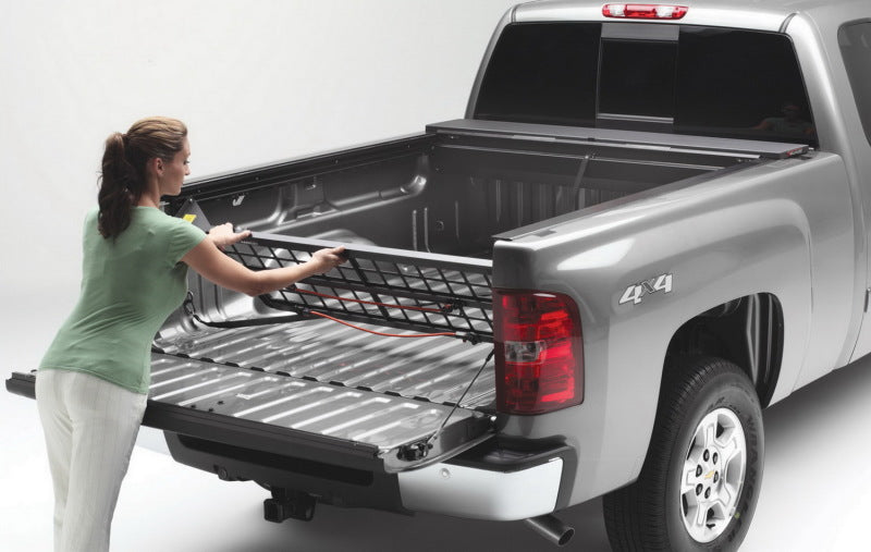 Roll-N-Lock 07-14 Chevy Silverado/Sierra w/ OE Rail Caps LB 96-1/4in Cargo Manager