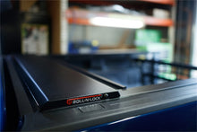 Load image into Gallery viewer, Roll-N-Lock 07-21 Toyota Tundra Regular Cab/Double Cab 77in E-Series Retractable Tonneau Cover