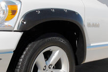 Load image into Gallery viewer, Lund Dodge Ram 1500 RX-Rivet Style Smooth Elite Series Fender Flares - Black (4 Pc.)