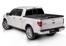 Load image into Gallery viewer, UnderCover Ram 1500 (Classic) / Ram 2500 HD 6.4ft Elite Bed Cover - Black Textured