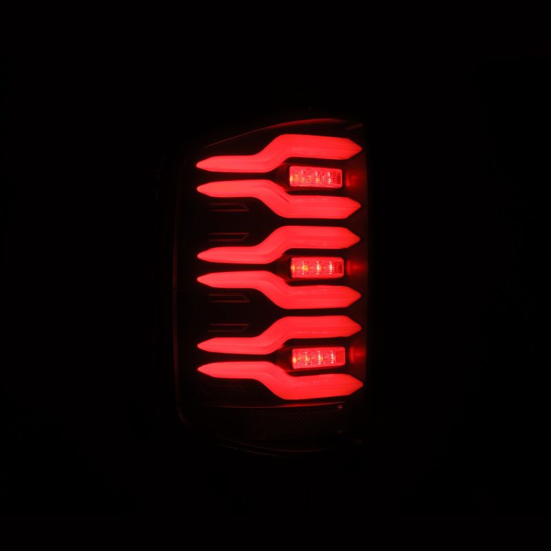 AlphaRex 14-19 Chevrolet Silverado Luxx-Series LED Tail Lights Black w/Activ Light/Seq Signal