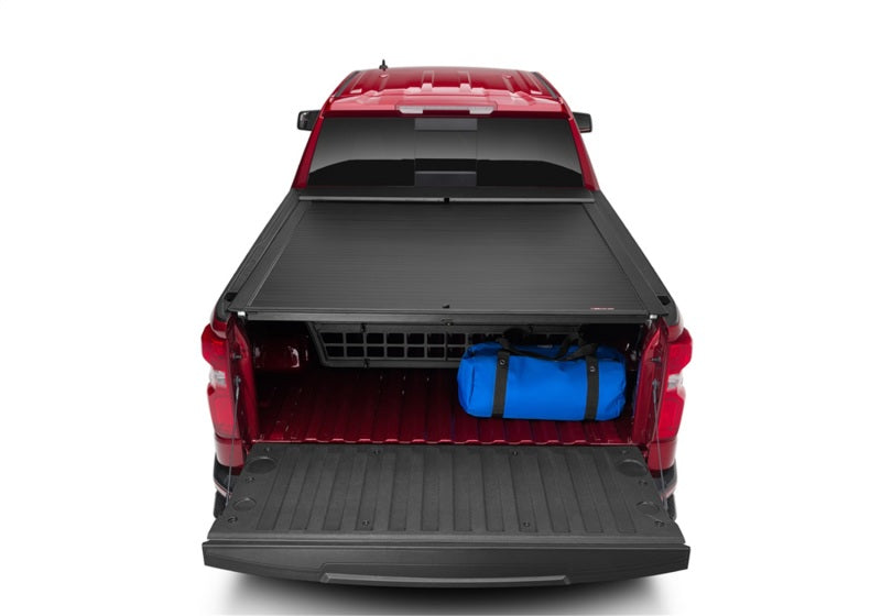 Roll-N-Lock 07-14 Chevy Silverado/Sierra w/ OE Rail Caps LB 96-1/4in Cargo Manager