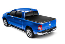 Load image into Gallery viewer, Lund Dodge Ram 1500 (5.5ft. Bed) Genesis Elite Tri-Fold Tonneau Cover - Black