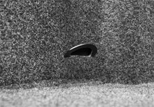 Load image into Gallery viewer, Close-up view of the BedRug textured surface showing the clamp